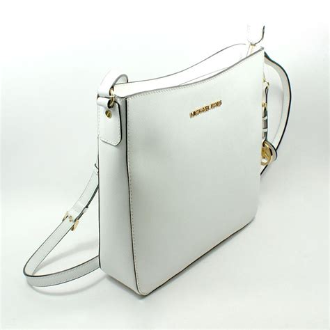 michael kors messenger bag white|Michael Kors studded crossbody bag.